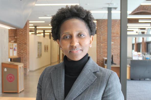 student in business suit and turtleneck